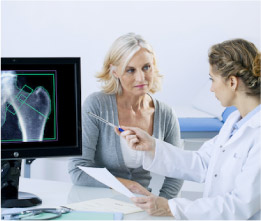 Looking at x-ray with doctor for medico legal service in Melbourne